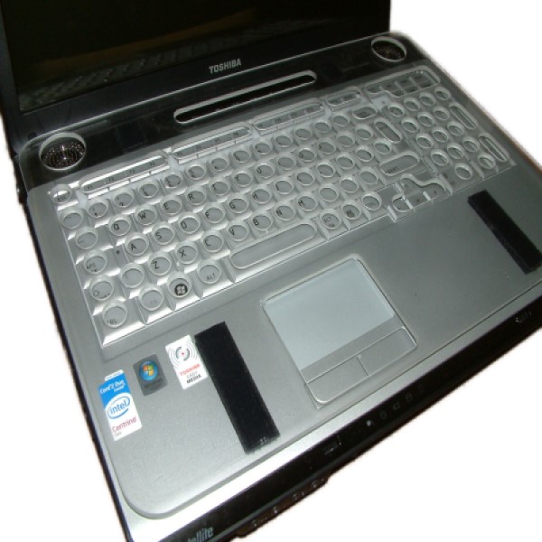 Laptop with Plastic key guard keyboard cover close up