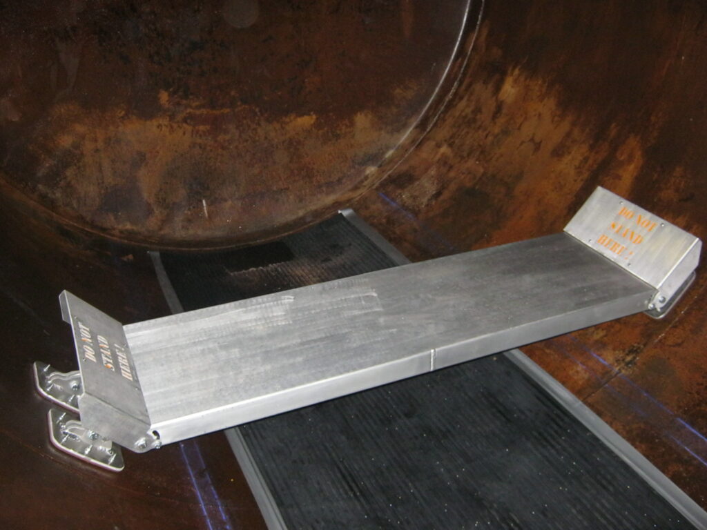 Adjustable platform for tank lining